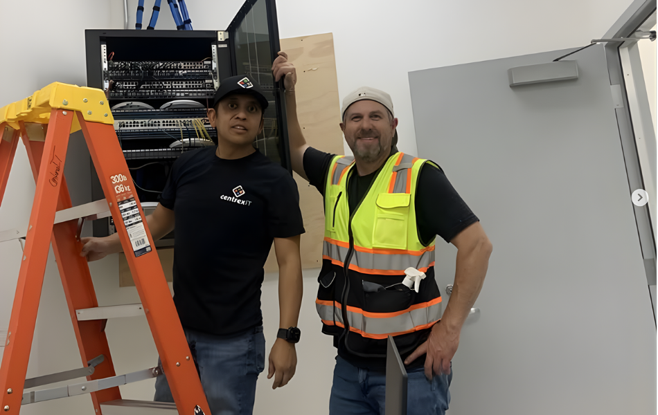 centrexIT leadership team including CEO working on-site during weekend to help client with cabling and wireless setup