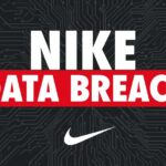 security professional reviewing network access logs on multiple monitors in a standard office environment